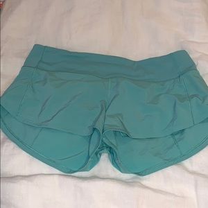 Teal/Green lululemon speed up 2.5 shorts
